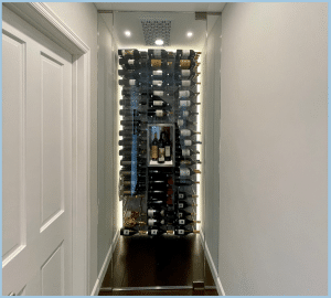 Small Wine Cellar Installed in a Narrow Hallway in a Modern Home in Newport Beach, Orange County