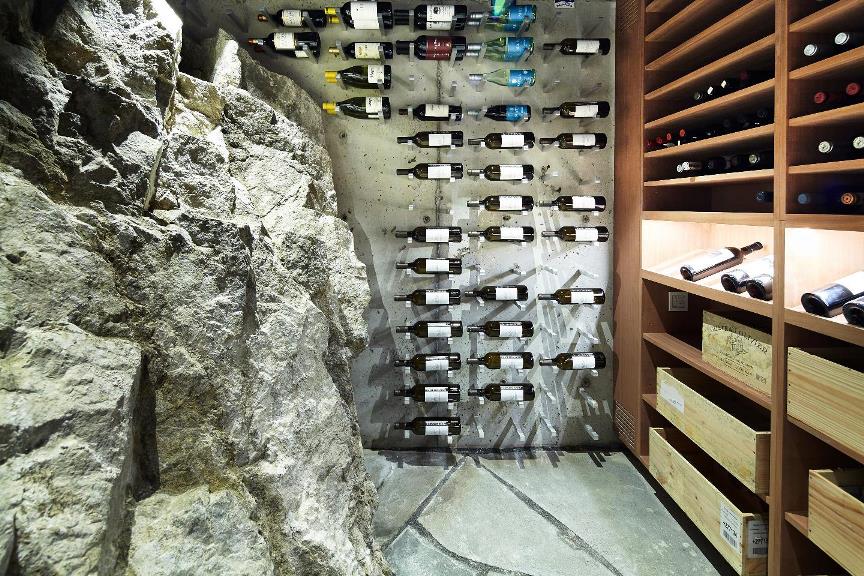 Orange County Transitional custom wine cellar with Metal and Wooden Wine Racks