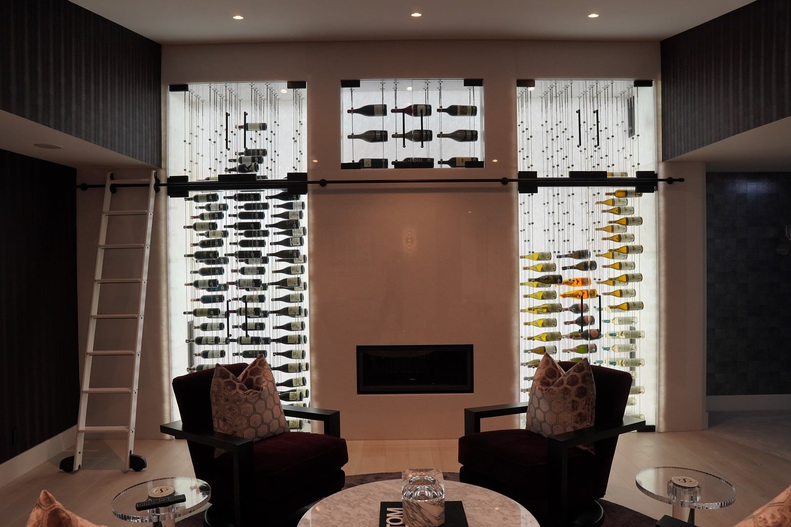 This is how an entire wine cabinet looks with IronWine Cellars cable racks and our acrylic LED light wall.