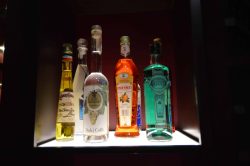 10 - Wine Bottles Placed in Wooden Wine Racks Wine Bottles Placed in Wooden Wine Racks