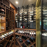 Impressive Closet Wine Cellar with Wood and Metal Elements Built in a Modern Home